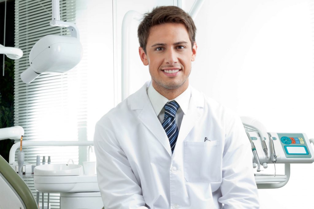 male dentist in one of his dental offices in Port St. Lucie